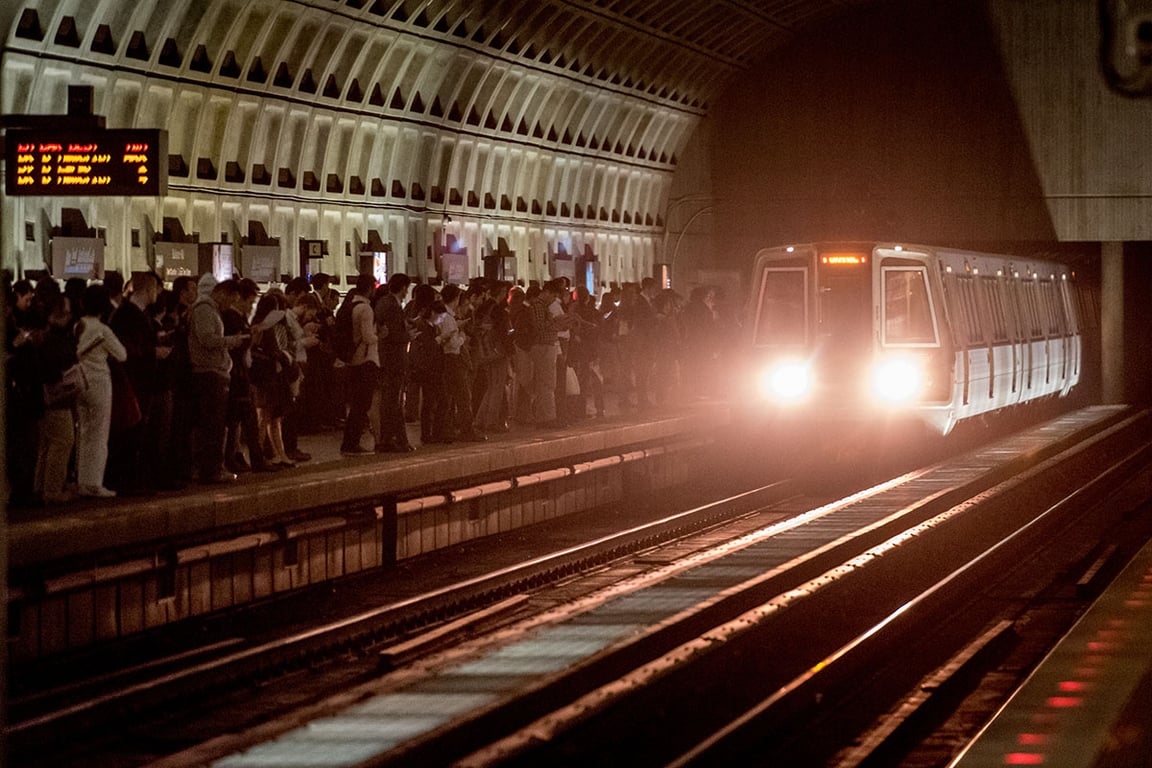 CrowdedPlatformIncomingMetro