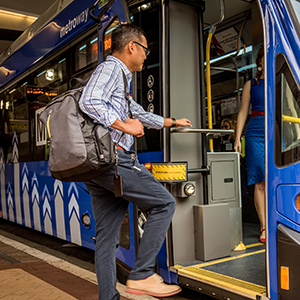 Rider boarding a Metroway bus, Arlington, Virginia